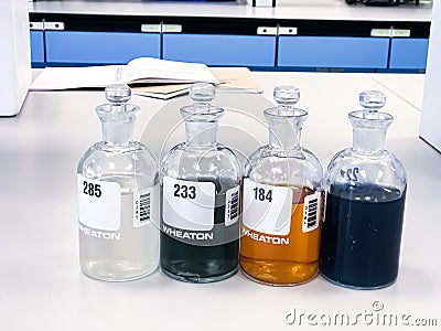 BOD bottle for analysis Biochemical Oxygen Demand in wastewater sample, precipitation with solvent in flask, can use as a science. Stock Photo