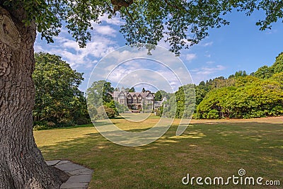 Bodnant Hall viewed from the grand meadow, Bodnant garden, Wales Editorial Stock Photo