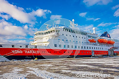 Bodo, Norway - April 09, 2018: Outdoor view of Hurtigruten coastal vessel KONG HARALD, is a daily passenger and freight Editorial Stock Photo