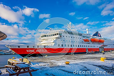 Bodo, Norway - April 09, 2018: Outdoor view of Hurtigruten coastal vessel KONG HARALD, is a daily passenger and freight Editorial Stock Photo