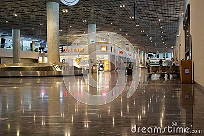 Bodrum, Turkey - August, 2020: Arrivals hall with glittering store windows of Duty Free stores at Bodrum airport Editorial Stock Photo