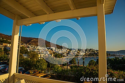 BODRUM, TURKEY: View of the white houses and the beach and the mountains in the city of Bodrum. Editorial Stock Photo