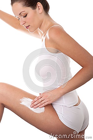 Body care - Young woman apply cream Stock Photo