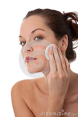 Body care - Young woman remove make-up Stock Photo