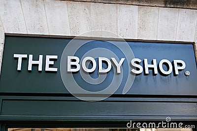 The body shop logo brand and text sign front of green entrance beauty cosmetic shop Editorial Stock Photo