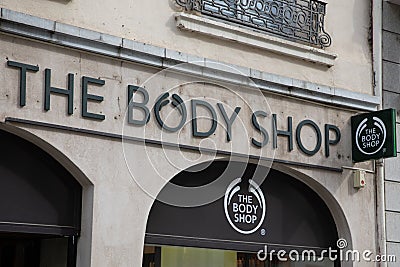 the body shop logo brand and text sign front wall entrance beauty cosmetic shop facade Editorial Stock Photo