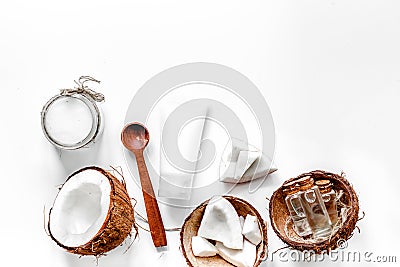 Body treatment. Coconut oil and cream on white background top view copyspace Stock Photo