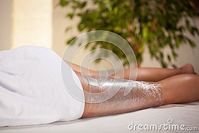 Body wrapping in spa room Stock Photo