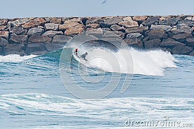 Bodyboarder surfing ocean wave Stock Photo