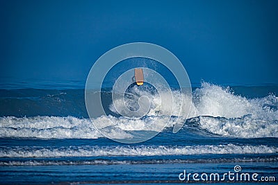 Bodyboarder surfing ocean wave Stock Photo