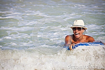 Bodyboarder surfing a wave Stock Photo