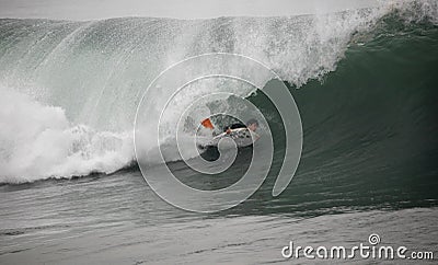 Bodyboarder in the tunnel Stock Photo