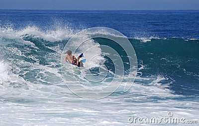 Bodyboarder in a wave at Laguna Beach, CA. Editorial Stock Photo