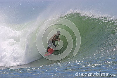 Bodyboarding Surfing a Tube Wave in Hawaii Editorial Stock Photo