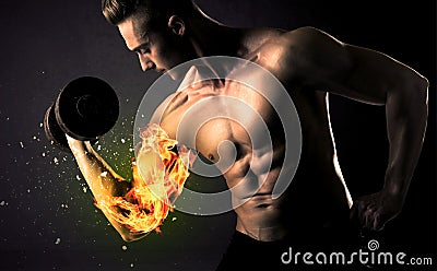 Bodybuilder athlete lifting weight with fire explode arm concept Stock Photo