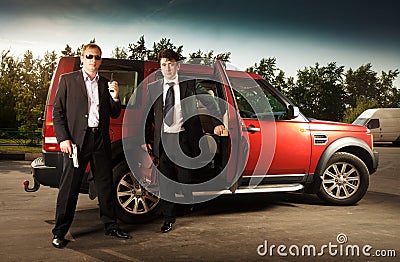 Bodyguard and its boss Stock Photo