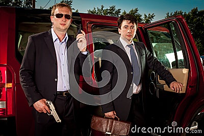 Bodyguard and its boss Stock Photo