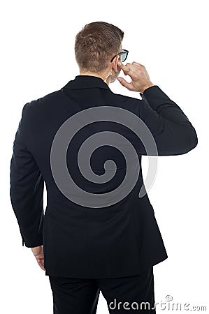 Bodyguard listening to vital information carefully Stock Photo