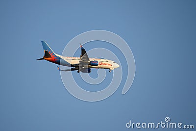 A Boeing 737-300 flight number G-GDFK of a British budget airline is coming in to land at Murcia-San Javier airport. Spain Editorial Stock Photo