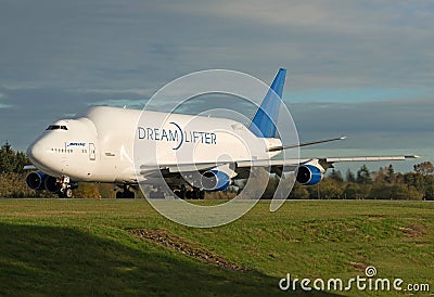 Boeing 747 LCF Large heavy cargo freighter in golden light Editorial Stock Photo