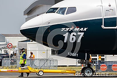 Boeing 737 MAX passenger plane towed towards the runway at the Paris Air Show. France - June 22, 2017 Editorial Stock Photo