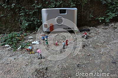 Bogor, Indonesia - October, 22 2022. Miniature figure of crowds of people with their respective activities Editorial Stock Photo