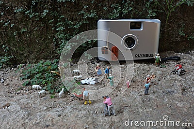 Bogor, Indonesia - October, 22 2022. Miniature figure of crowds of people with their respective activities Editorial Stock Photo