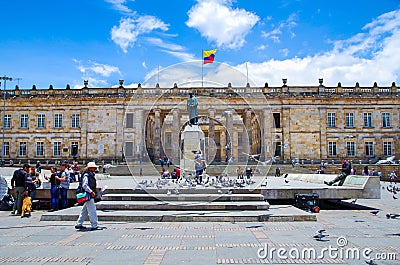 BOGOTA, COLOMBIA - OCTOBER 22, 2017: Unidentified people walking and taking pictures of the beautiful statue monument of Editorial Stock Photo