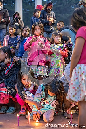 Indigenous children hold candles Editorial Stock Photo