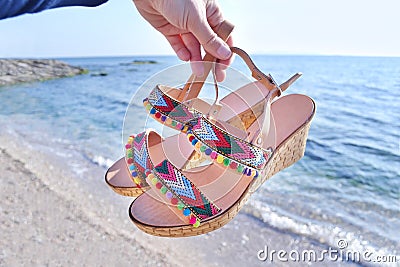Bohemian greek sandals on the beach Stock Photo
