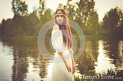 Bohemian lady at river Stock Photo