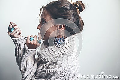 Boho jewelry and woolen sweater on model Stock Photo