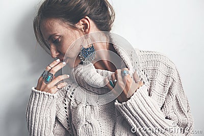 Boho jewelry and woolen sweater on model Stock Photo