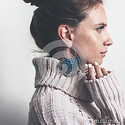 Boho jewelry and woolen sweater on model Stock Photo