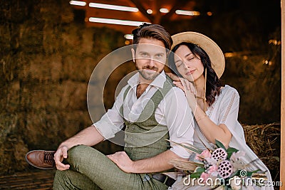 Portrait of newlyweds in boho style at ranch Stock Photo