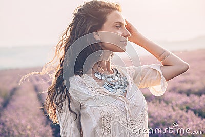 Boho styled model in lavender field Stock Photo