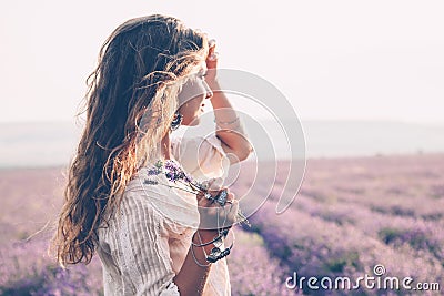 Boho styled model in lavender field Stock Photo