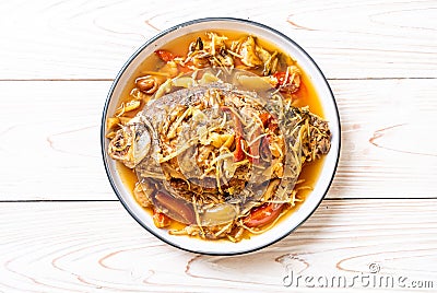 Boiled Carp fish with pickled lettuce Stock Photo
