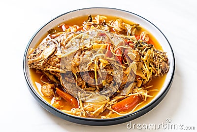 Boiled Carp fish with pickled lettuce Stock Photo