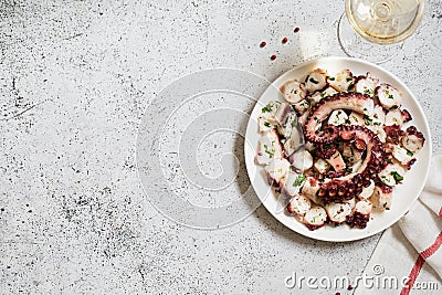 boiled chopped octopus on a concrete table Stock Photo