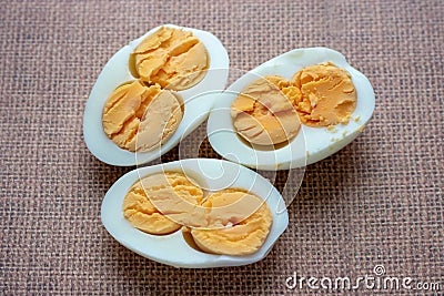 Boiled egg isolated on brown background cutout.easter Stock Photo
