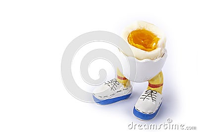 Boiled egg open half with legs isolate Stock Photo