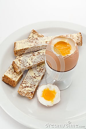 Boiled egg and toast soldiers Stock Photo