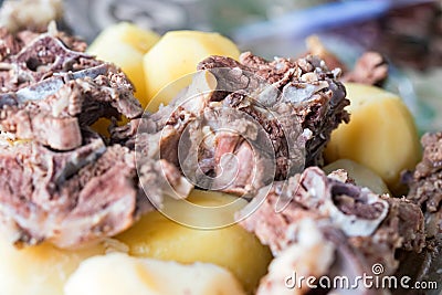 Boiled lamb meat and whole potatoes close up Stock Photo