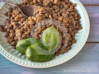 Boiled lentils in a ceramic plate taken from a very close distance Stock Photo