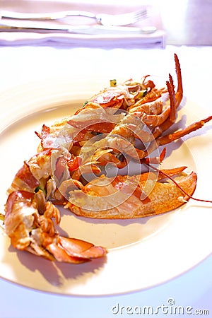 Boiled lobster with cranberry puree Stock Photo