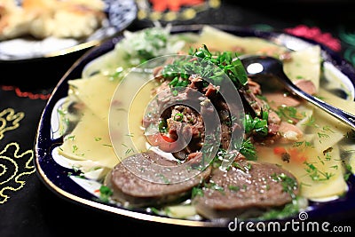 Boiled meat with noodles Stock Photo