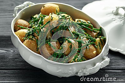 Boiled new potato with fresh samphire and garlic Stock Photo