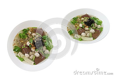 Boiled pork blood soup with flavoring herbs, Popular food can be eaten anytime. Speaking Thailand ` Tom Luad Muu ` Stock Photo