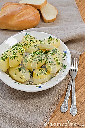 Boiled potatoes and bread Stock Photo